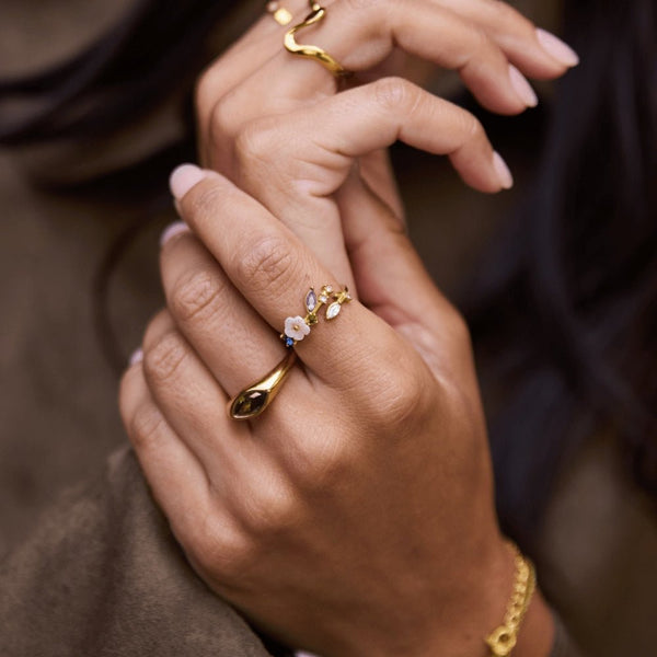 Kristallweiße Blütenringe Gold