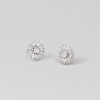 Silver Sunflower Stud Earrings, a pair of flower-shaped studs on a plain grey background, each